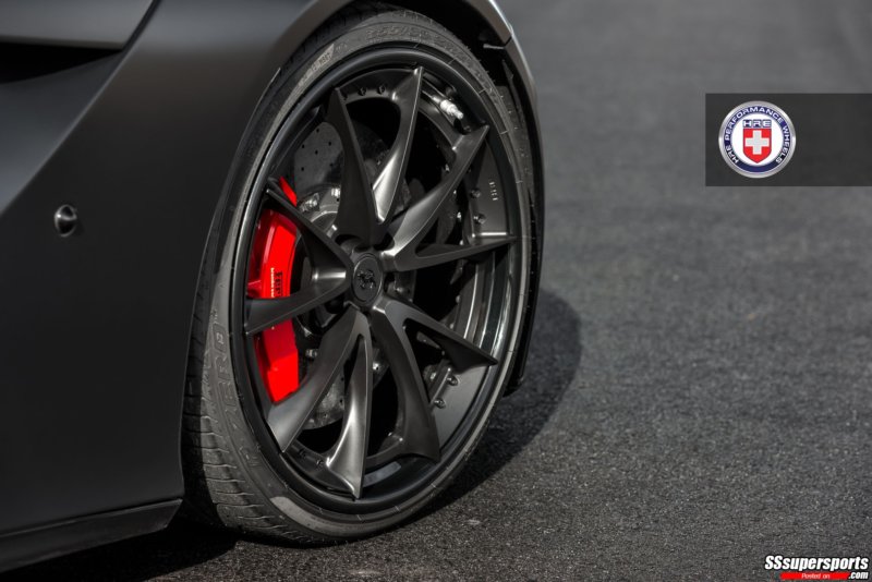 3-satin-black-ferrari-f12berlinetta-on-hre-s204-front-wheel-red-brake-caliper