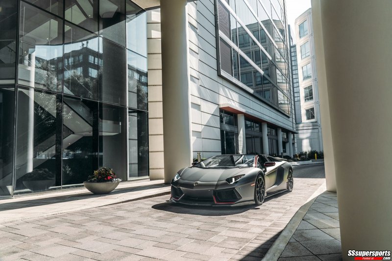 7-frozen-gray-dmc-lamborghini-aventador-roadster-on-adv1-wheels-front-side-view